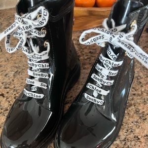 Rubber Chloe boots. Size 8 1/2. Practically new. Barely used.